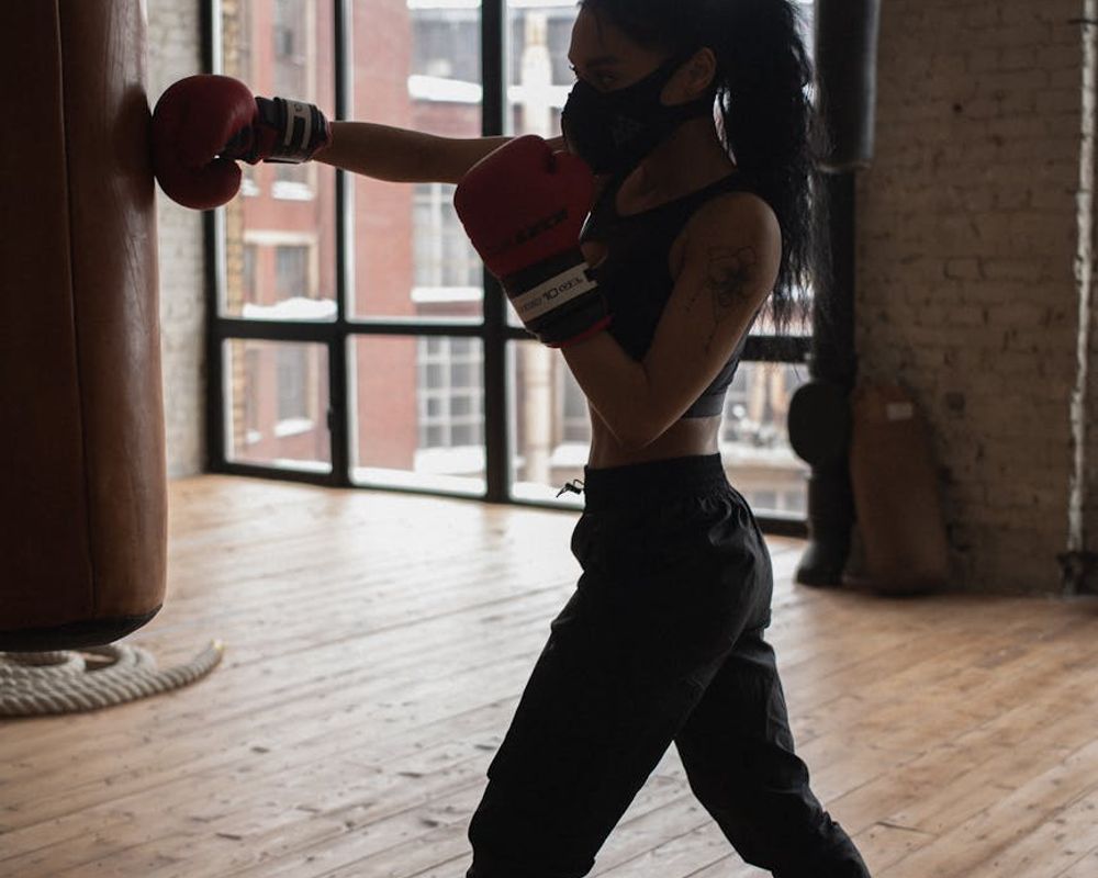 Detailed view of fitness equipment and a man hands during a workout.