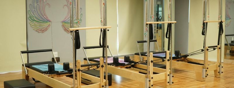 Minimalist arrangement of fitness equipment on a clean floor.