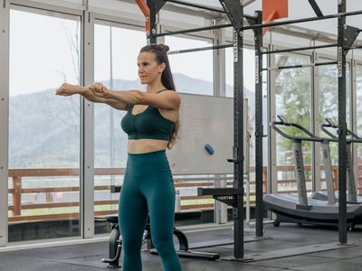 Stretching exercises in a modern architectural environment.